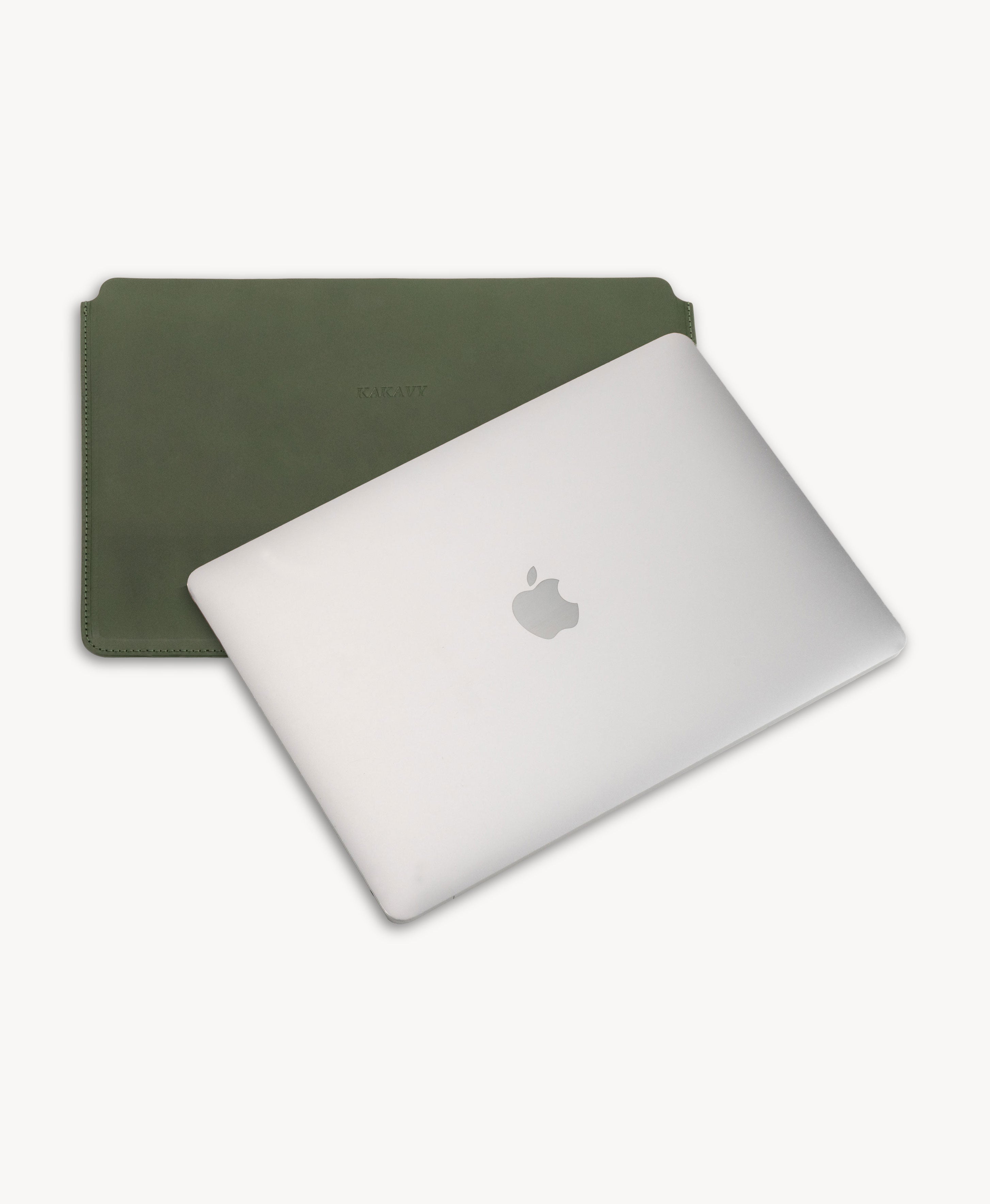 Forest Green full grain saddle leather laptop sleeve, shown with a MacBook