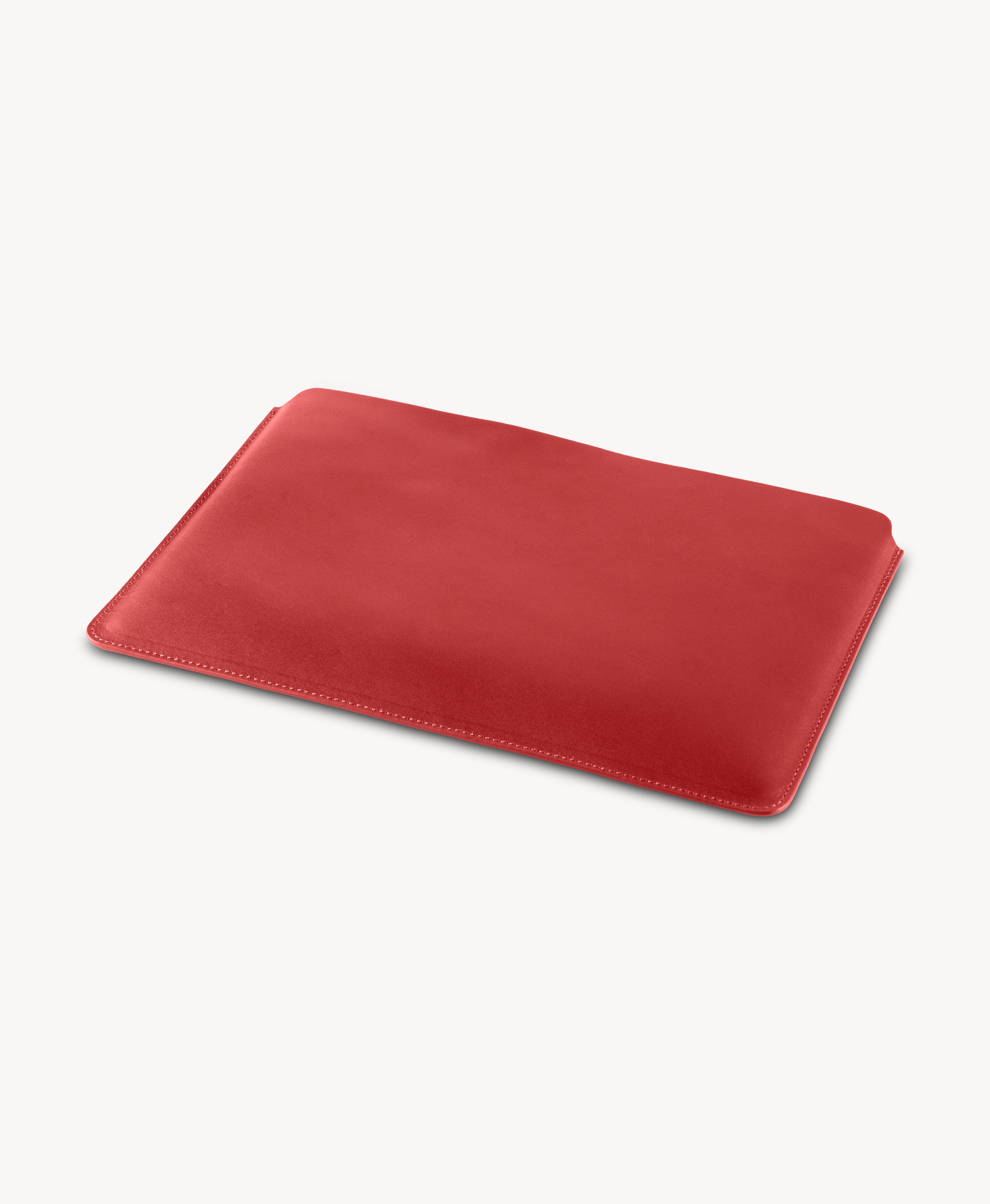 Red full grain saddle leather laptop sleeve, angled product view