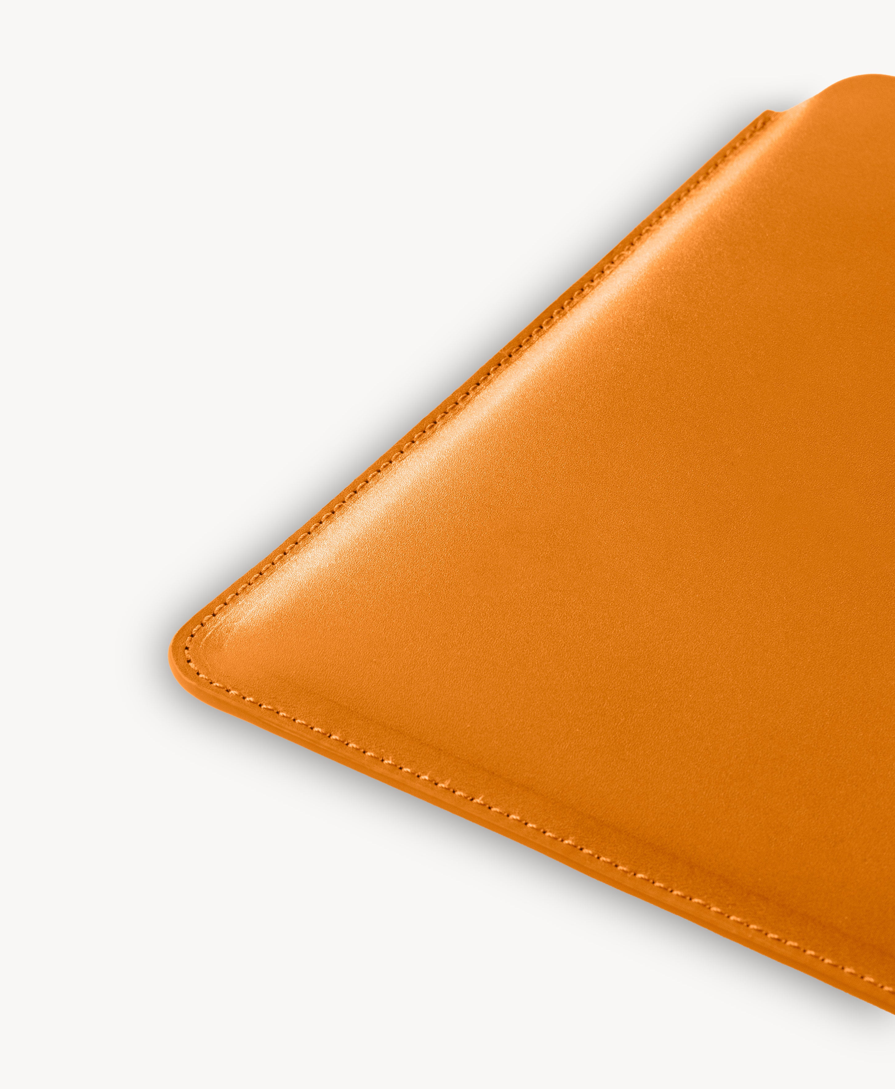 Honey Tan full grain saddle leather laptop sleeve, stitched edge detail