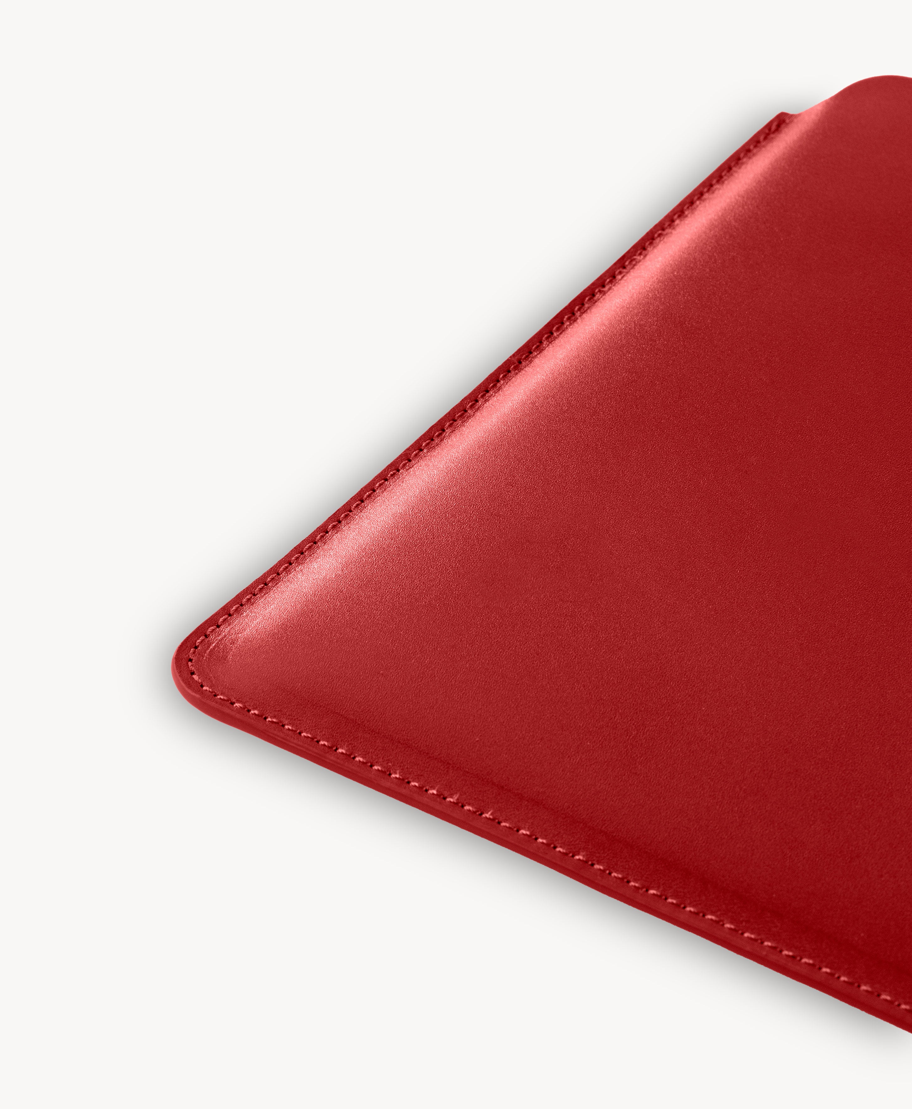 Red full grain saddle leather laptop sleeve, stitched edge detail