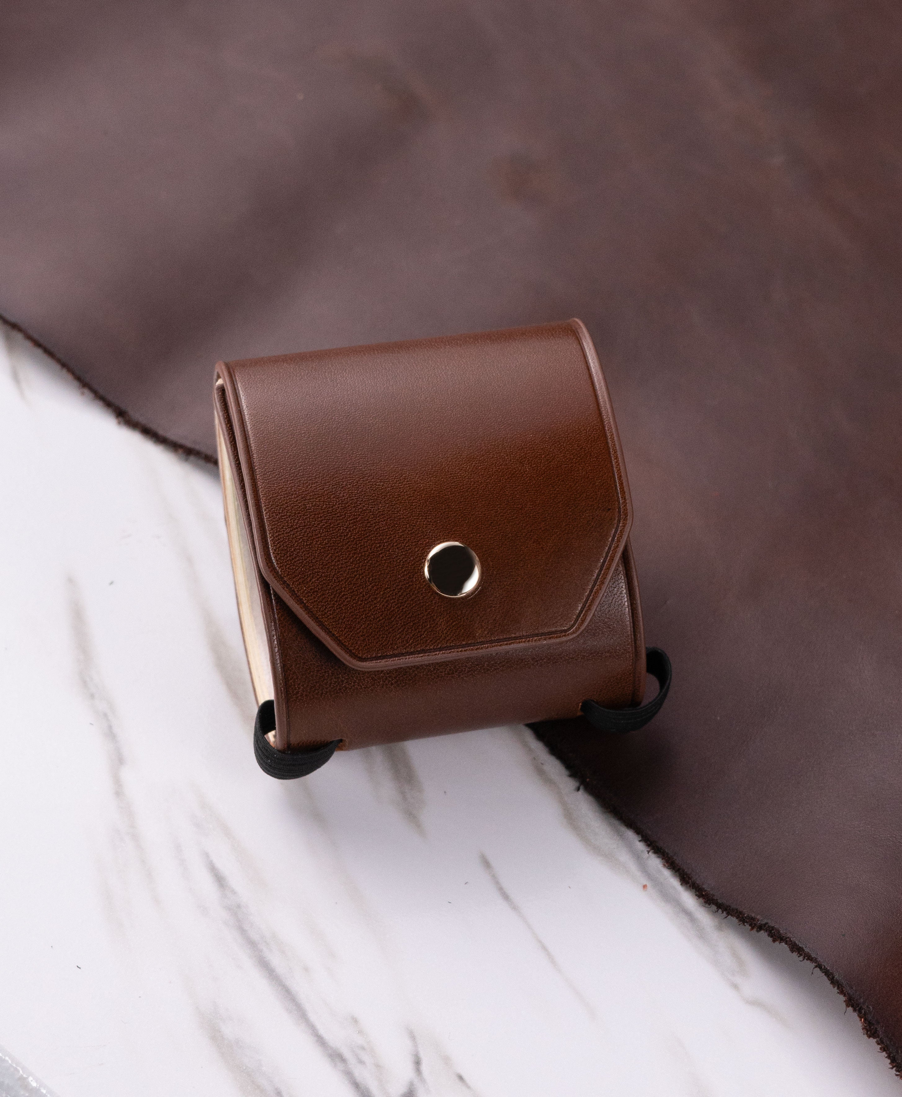 Brown full-grain saddle leather cash wrap wallet lifestyle view 4