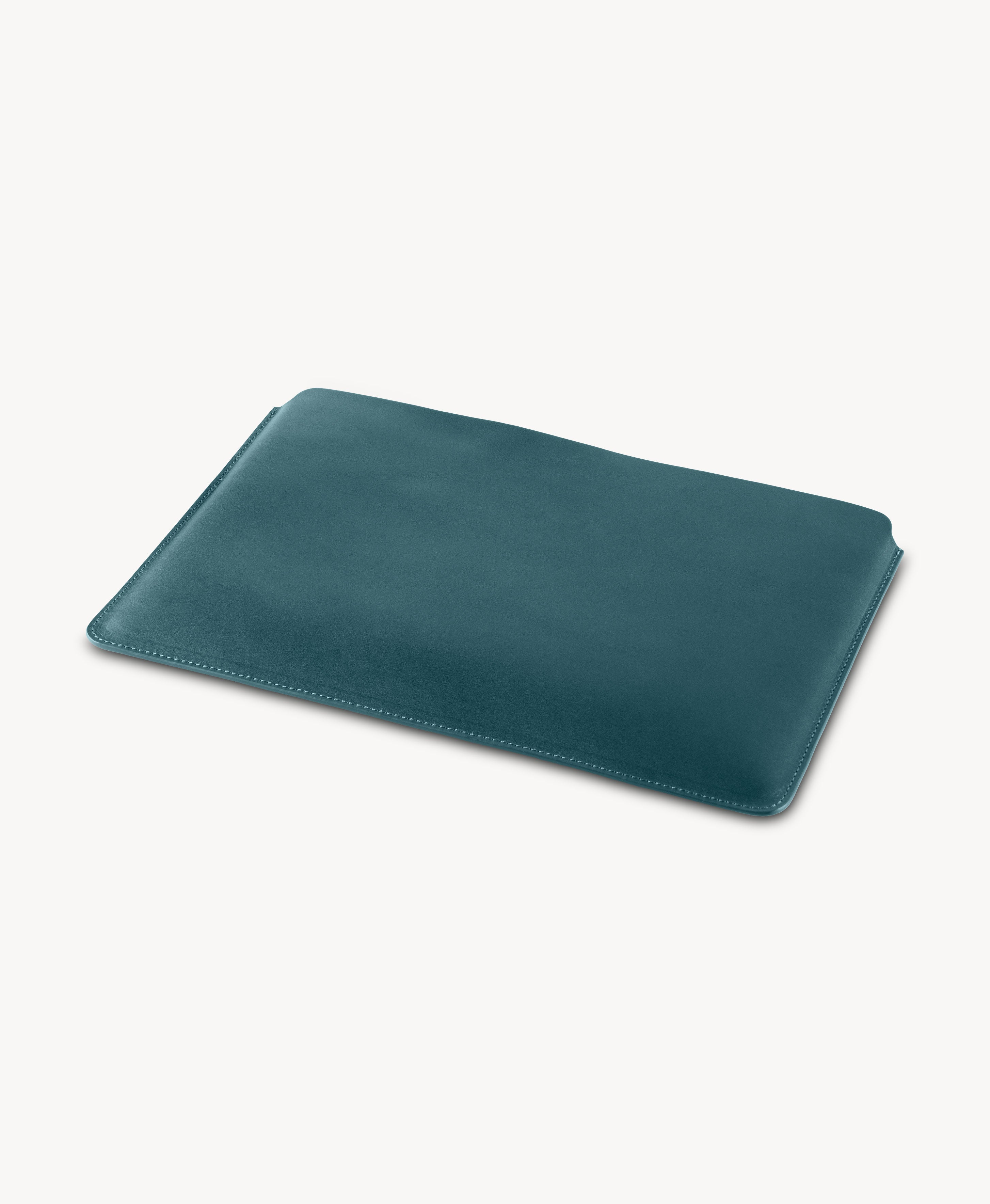 Blue full grain saddle leather laptop sleeve, angled product view