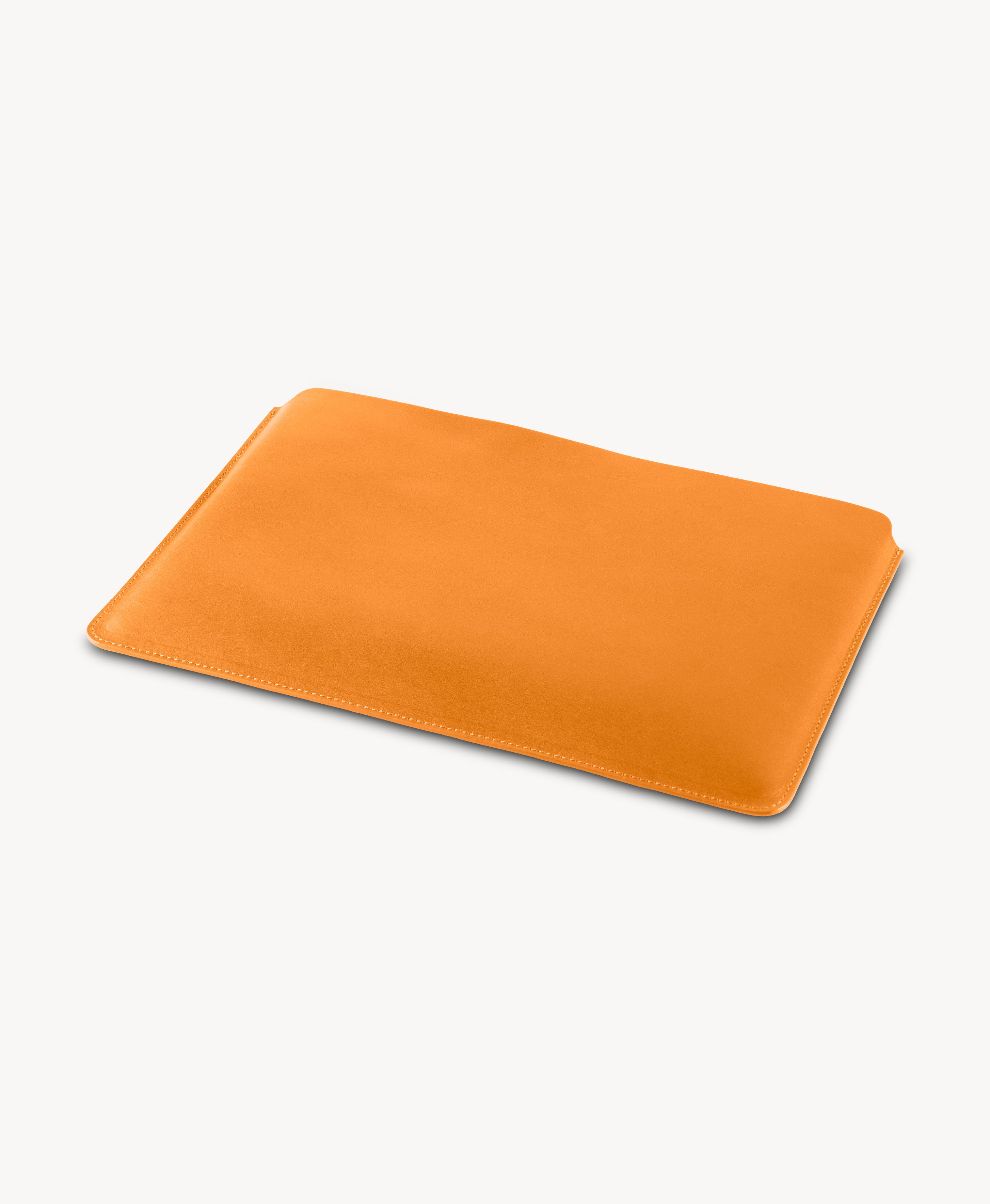 Honey Tan full grain saddle leather laptop sleeve, angled product view