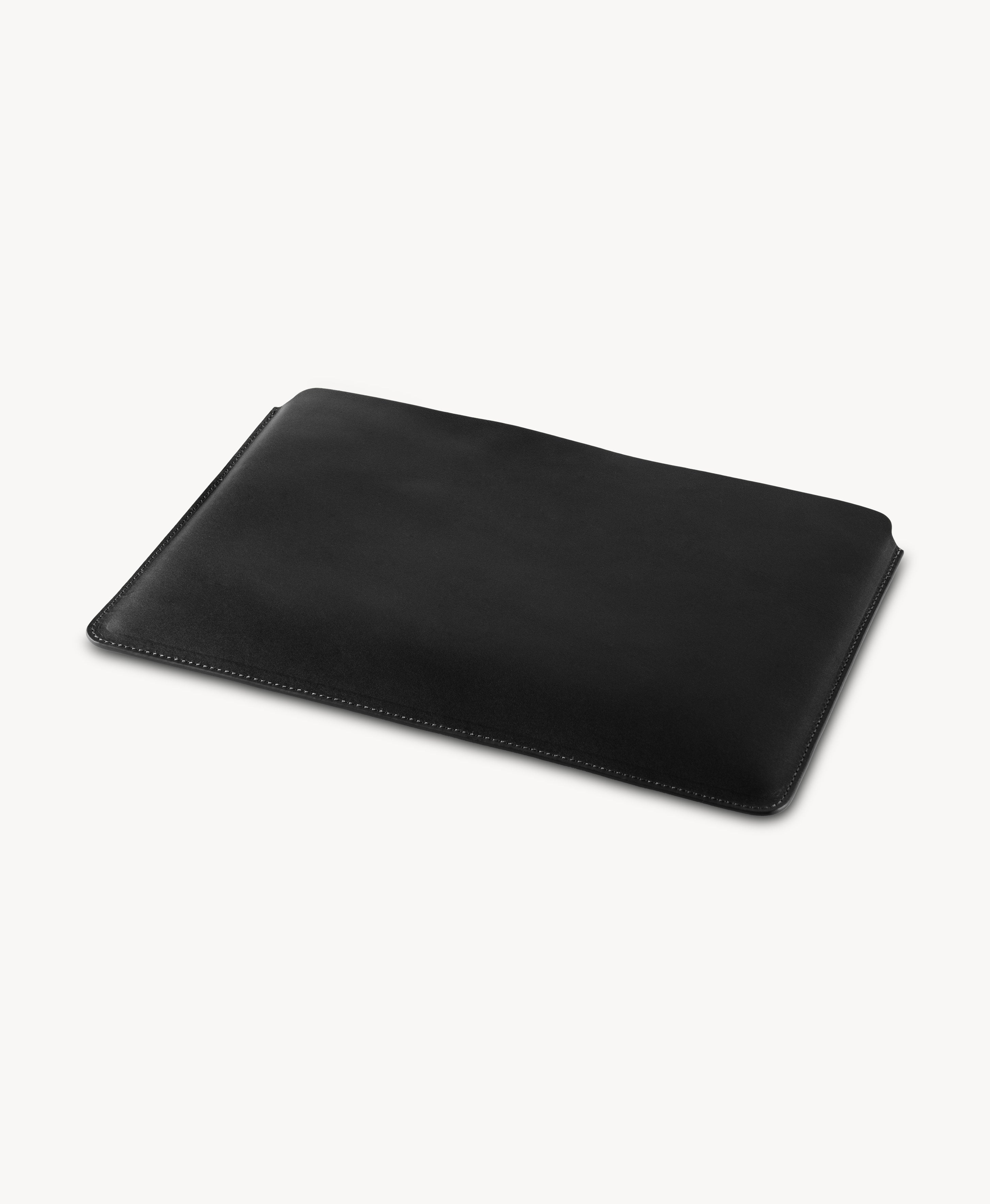 Black full grain saddle leather laptop sleeve, angled product view