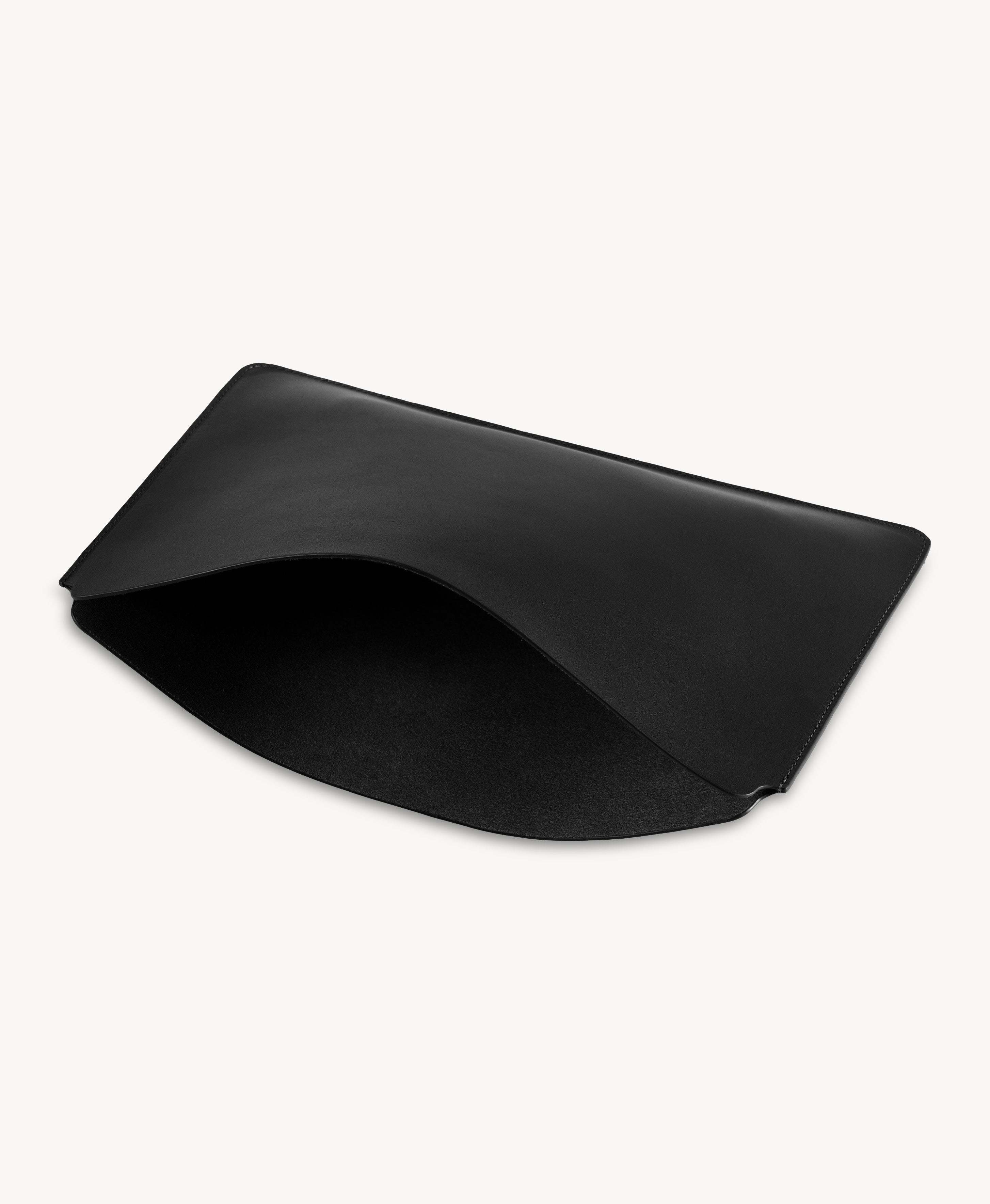 Black full grain saddle leather laptop sleeve, open top and interior view