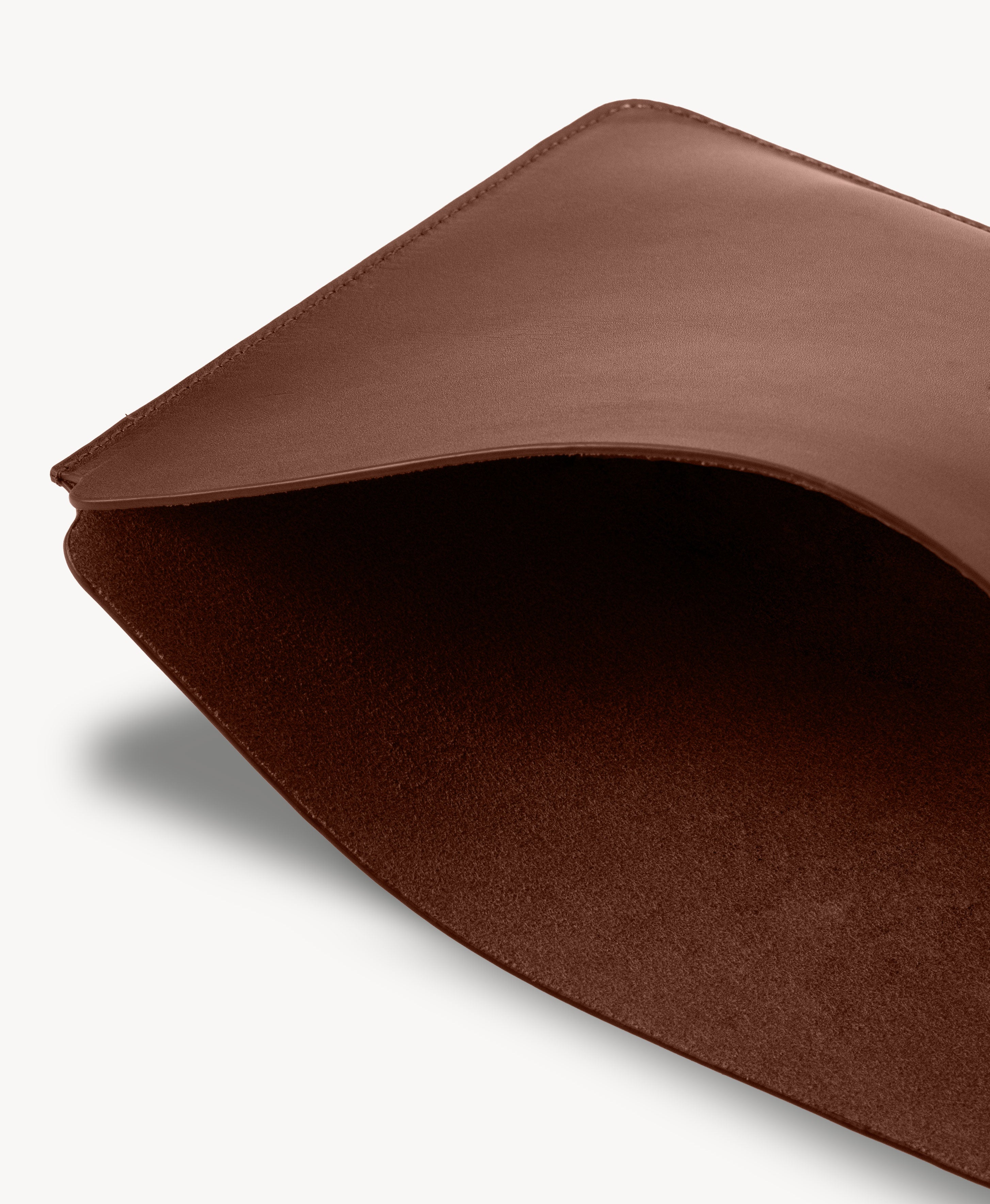 Brown full grain saddle leather laptop sleeve, interior close-up