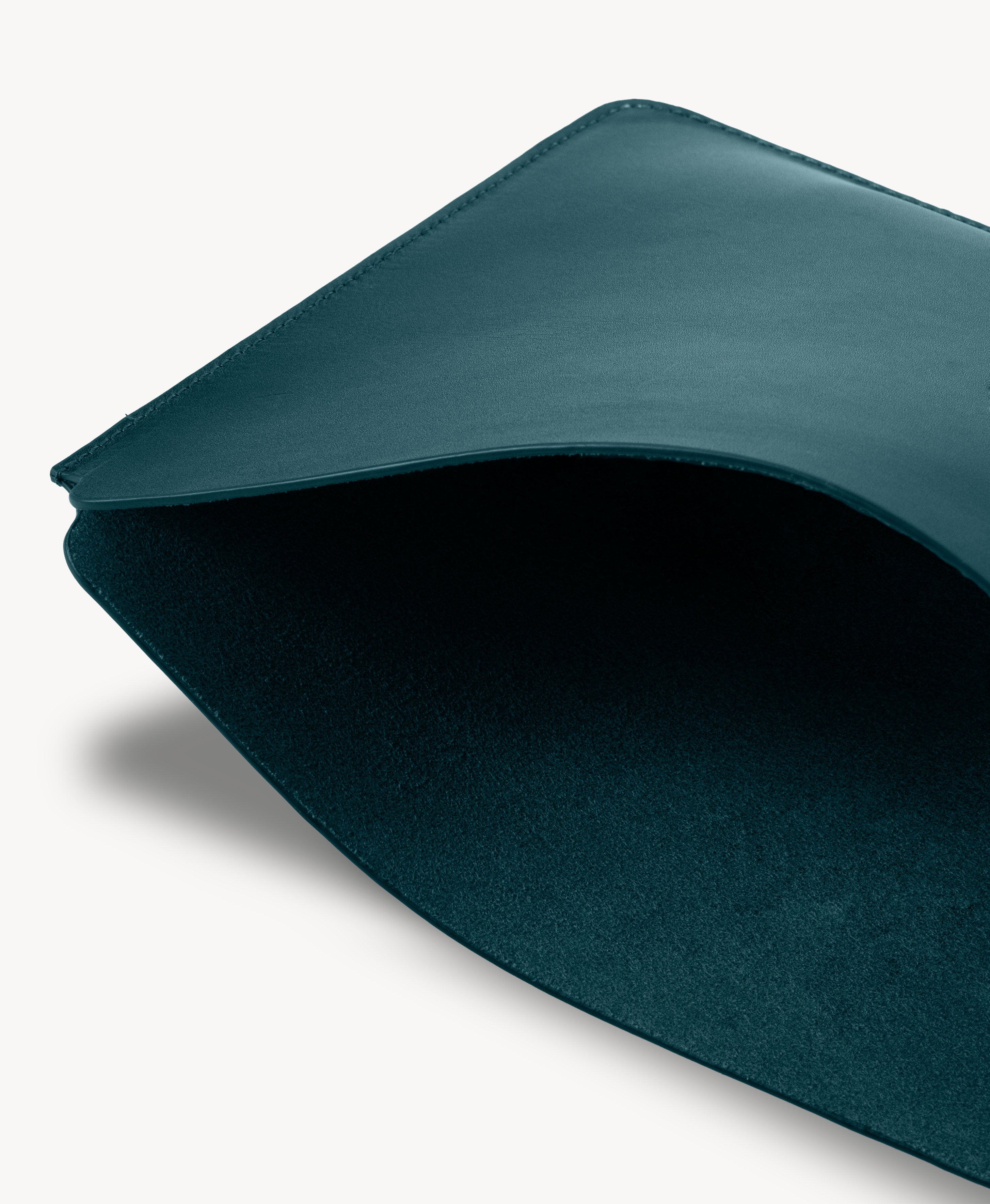 Blue full grain saddle leather laptop sleeve, interior close-up