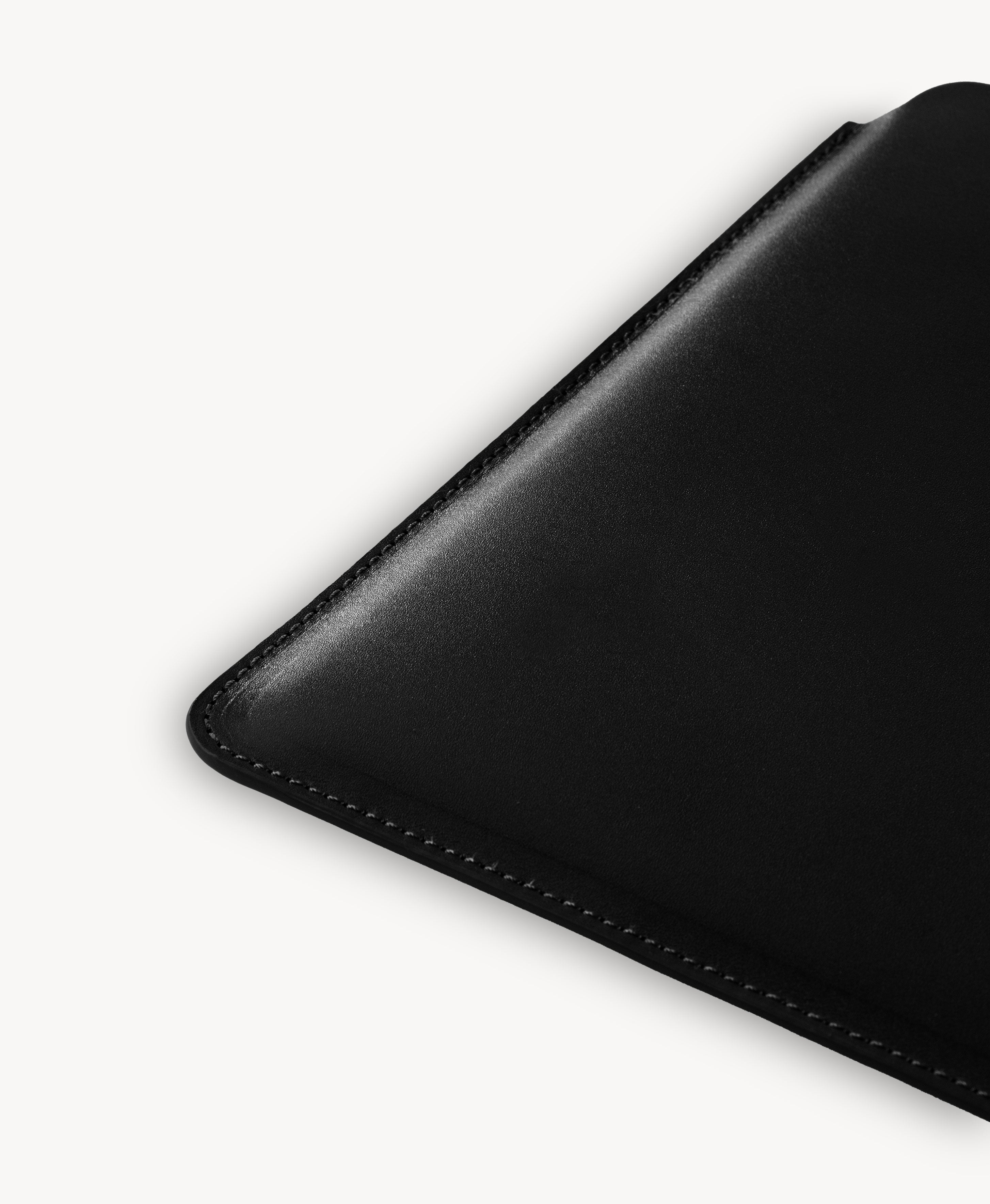 Black full grain saddle leather laptop sleeve, stitched edge detail