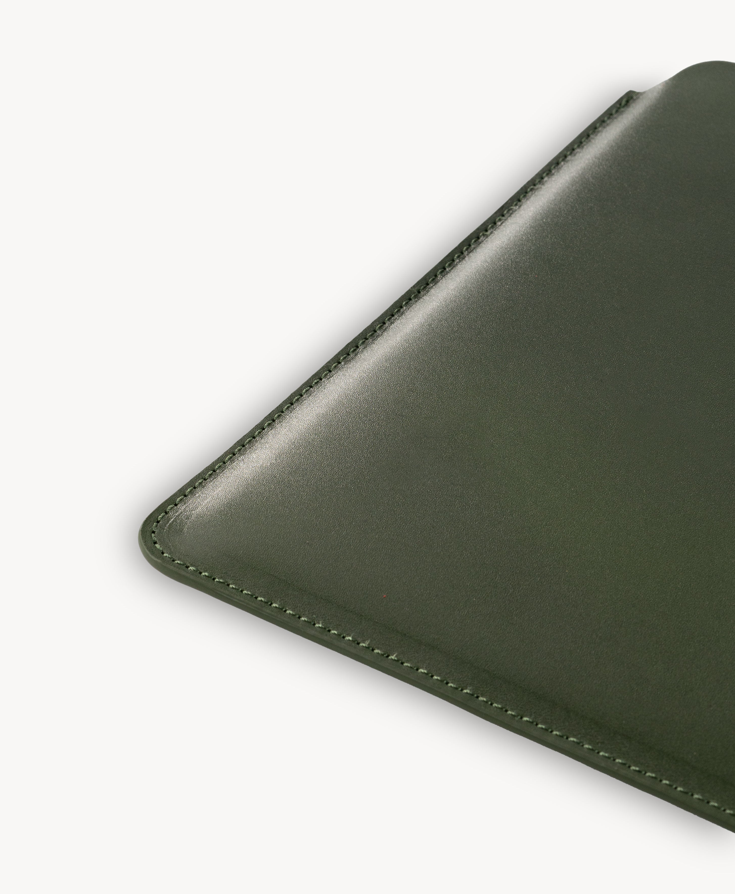 Forest Green full grain saddle leather laptop sleeve, stitched edge detail